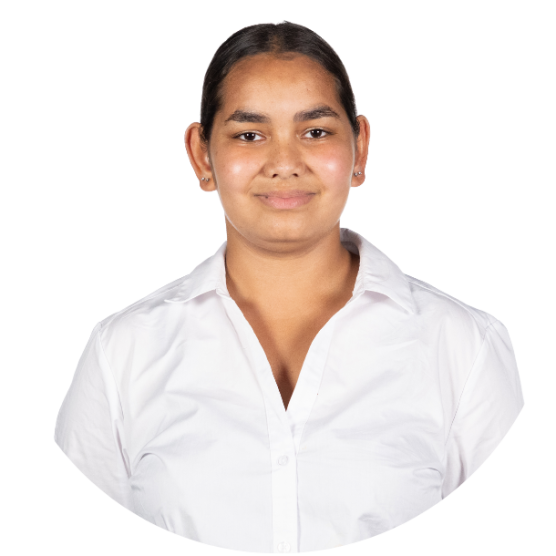 Young person with dark hair tied back wearing a white collared shirt, smiling.